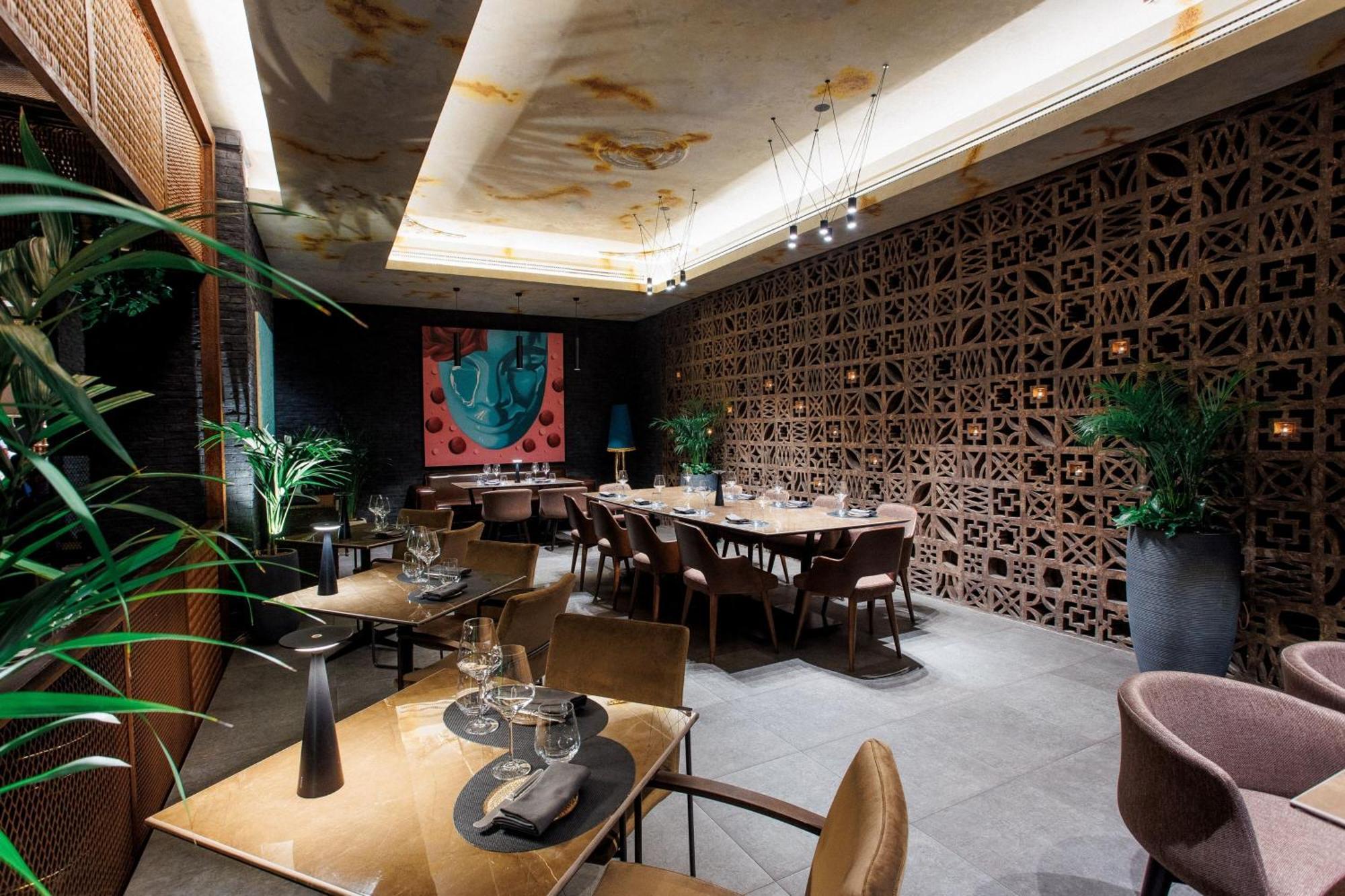 Hotel The St. Regis Ad Dawhah Esterno foto Restaurant interior