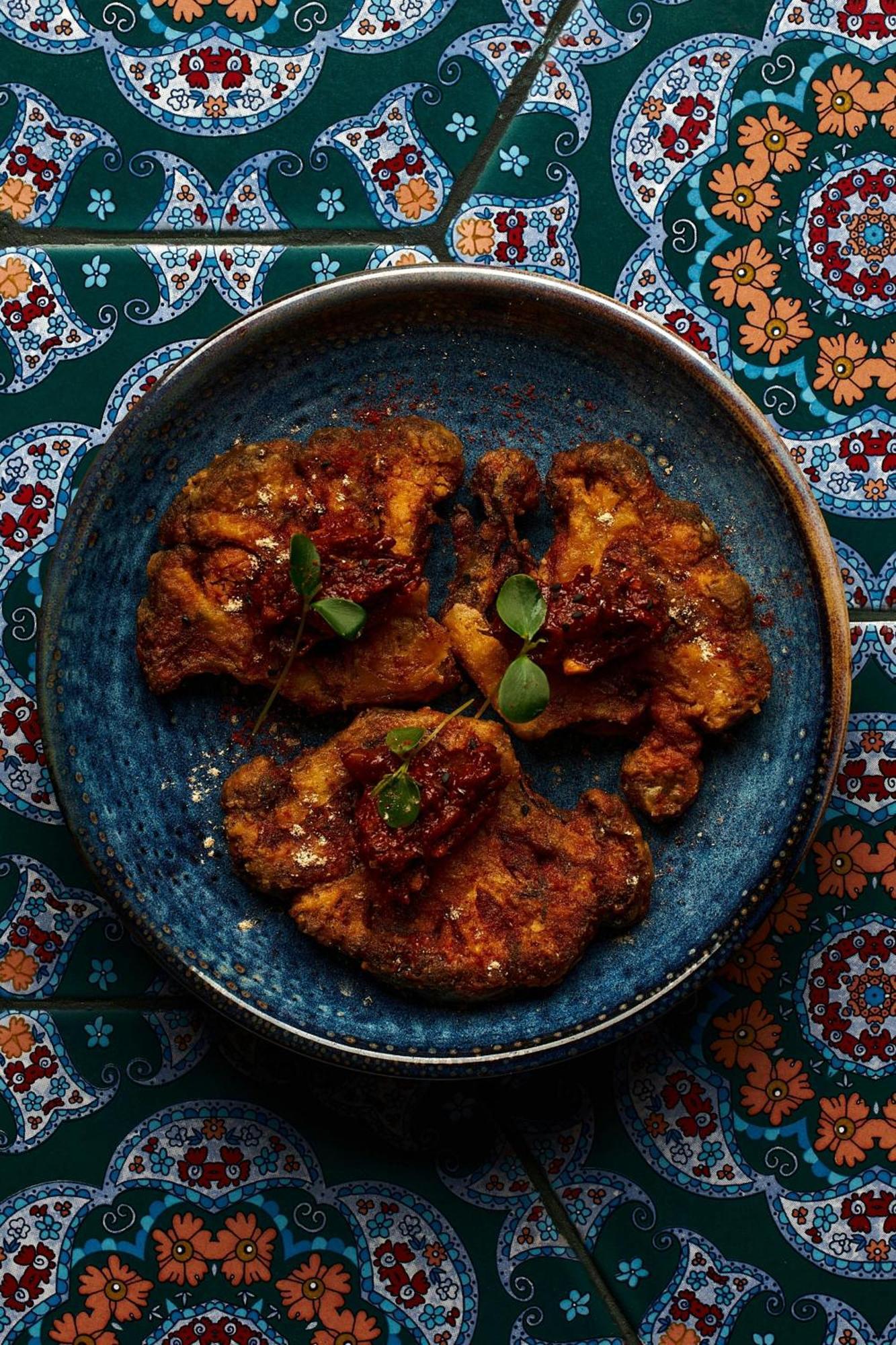 Hotel The St. Regis Ad Dawhah Esterno foto Chicken 65